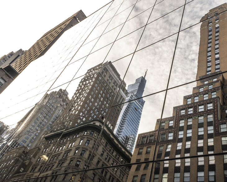 A view of a reflection of buildings